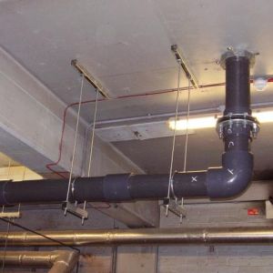 8 inch diameter PVC water supply pipe c/w fire damper installed in roof – Magna Science Museum Rotherham